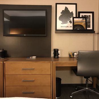 Hampton Inn Brooklyn/Downtown - TV. Basic cable (direct tv) and awesome Brooklyn picture collage over desk. - Hotels Near Me - Brooklyn, New York Hampton Inn Brooklyn/Downtown - TV. Basic cable (direct tv) and awesome Brooklyn picture collage over desk. - Hotels Near Me - Brooklyn, New York