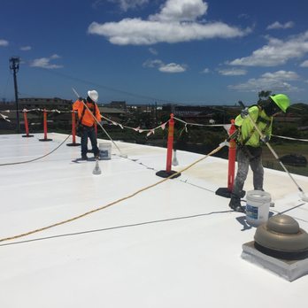 Surface Shield Roofing Company - Coats on coats on coats to achieve that beautiful finished product at Kalihi-Waena Elementary. - Roofing Near Me - Waipahu, Hawaii