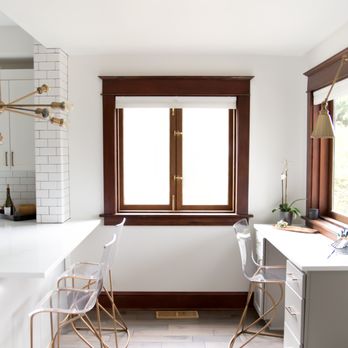 Kami Gray Interior Design - a kitchen with white countertops and white walls - Interior Design Near Me Kami Gray Interior Design - a kitchen with white countertops and white walls - Interior Design Near Me