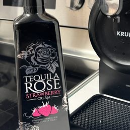 a bottle of tequila rose strawberries a bottle of tequila rose strawberries