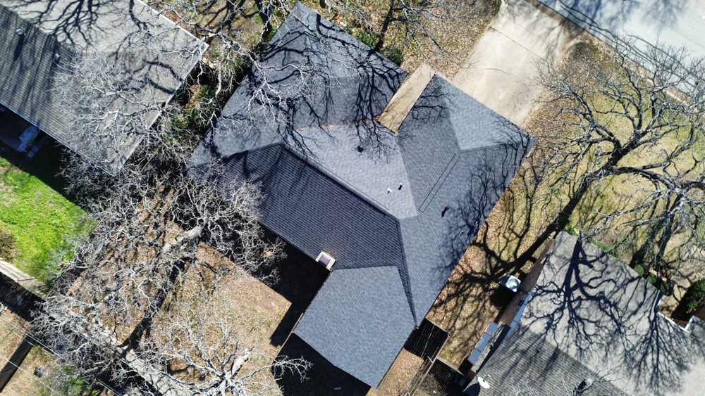 Slide of Uptown Roofing & Co