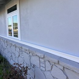 This is paint over natural stone that was yellow/beige It now looks smooth and stylish with our paint color and their painting.