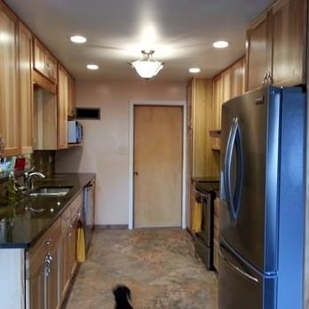 Diversified Construction - a kitchen with stainless steel appliances - General Contractors Near Me - East Alton, Illinois Diversified Construction - a kitchen with stainless steel appliances - General Contractors Near Me - East Alton, Illinois