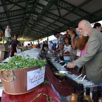 Wisteria Gardens - a man serving food at a farmers market - Farmers Market Near Me - Washington, DC, District of Columbia Wisteria Gardens - a man serving food at a farmers market - Farmers Market Near Me - Washington, DC, District of Columbia