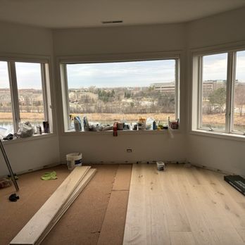 Royalty Windows & Siding - Living room during renovations showing thirty-year old Pella wood windows - Windows Installation Near Me - Glenview, Illinois