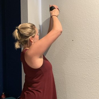 Kerrie'd Away Organizing - Action shot of Kerrie using power tools - Home Organization Near Me Kerrie'd Away Organizing - Action shot of Kerrie using power tools - Home Organization Near Me