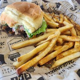 Classic cheeseburger and Cajun fries Classic cheeseburger and Cajun fries