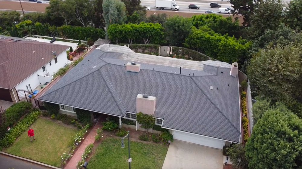 Slide of Honey Badger Roofing