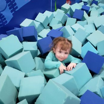 Smiley - Swimming in sponges - Indoor Playcenter Near Me - Indianapolis, Indiana