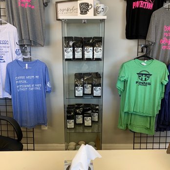Coffee & T’s - a variety of t - shirts on display - Coffee & Tea Near Me - Longview, Texas Coffee & T’s - a variety of t - shirts on display - Coffee & Tea Near Me - Longview, Texas