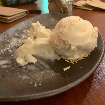 Khun Thai - Coconut ice cream has real slivers of coconut in it. Makes it seem a little icier than it really is. - Thai Near Me - Elsternwick, VIC Khun Thai - Coconut ice cream has real slivers of coconut in it. Makes it seem a little icier than it really is. - Thai Near Me - Elsternwick, VIC