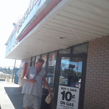 Speedway - a man walking out of a store - Convenience Stores Near Me - Gallipolis, Ohio