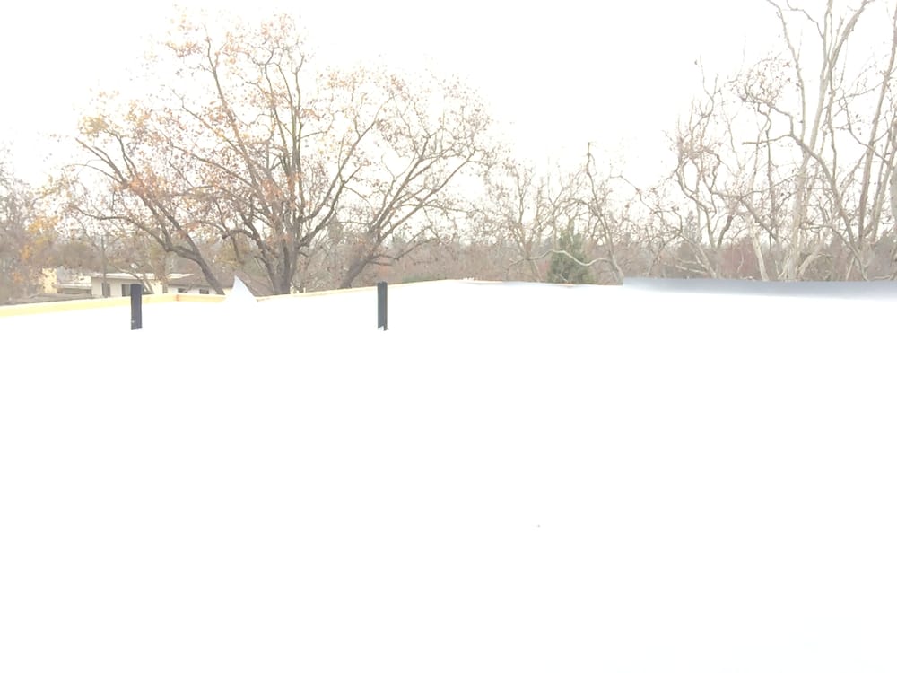 Slide of Caruzo's Roofing Contractors