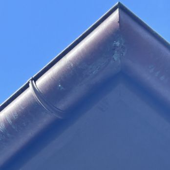 Gutter Professionals - Holes being eaten through the copper at seam - Gutter Services Near Me - West Palm Beach, Florida