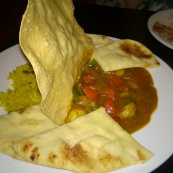The Charles Dickens Pub - Tiger Shrimp Curry dish, generous serving of shrimp, perfectly done naan and mango chutney. - British Near Me - Woodstock, Ontario The Charles Dickens Pub - Tiger Shrimp Curry dish, generous serving of shrimp, perfectly done naan and mango chutney. - British Near Me - Woodstock, Ontario