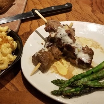Outback Steakhouse - Roasted Garlic Fillet Medallions with Creamy Mac 'n Cheese with Grilled Asparagus - Steakhouses Near Me - Parsippany, New Jersey Outback Steakhouse - Roasted Garlic Fillet Medallions with Creamy Mac 'n Cheese with Grilled Asparagus - Steakhouses Near Me - Parsippany, New Jersey