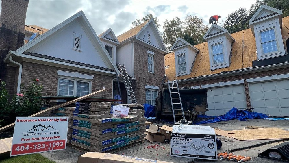 Slide of DIM Construction and Roofing