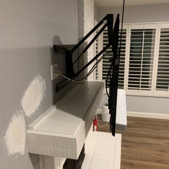 HD Custom Installations - Mantle Mount installation over fireplace with wire management. - Home Theatre Installation Near Me - Buena Park, California