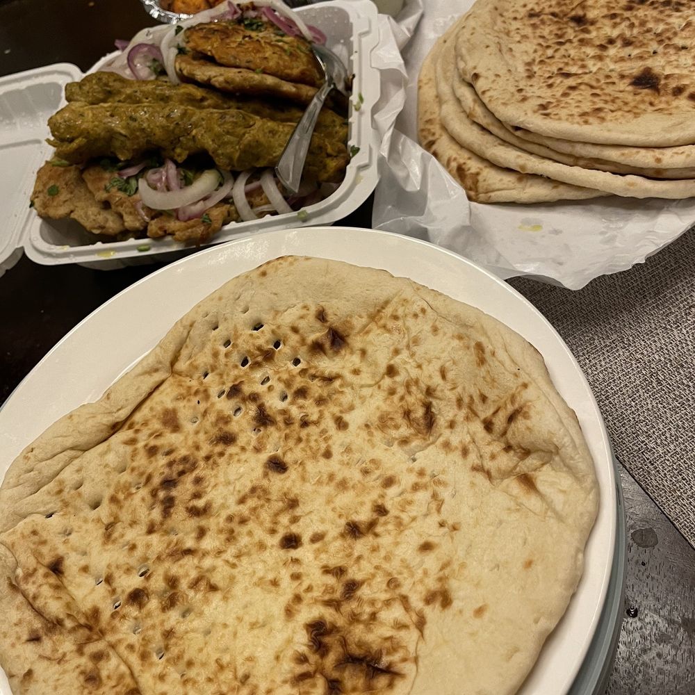 Zaika BBQ & Grill - Naan on dinner plate for scale - Pakistani Near Me - Edison, New Jersey Zaika BBQ & Grill - Naan on dinner plate for scale - Pakistani Near Me - Edison, New Jersey