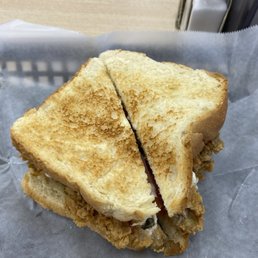 Fried oyster on white toast.