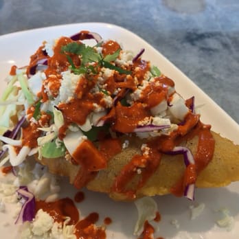 Nopalito - Empanada, fried masa pastry, grass-fed beef, tomato, jalapeno, cabbage, avocado, queso fresco, salsa frita de guajillo - Mexican Near Me - San Francisco, California