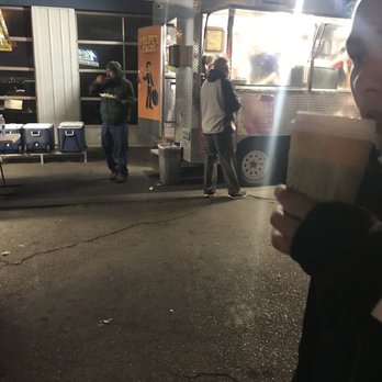 Felipe's Tacos - a woman holding a cup of coffee - Street Vendors Near Me - Las Vegas, Nevada Felipe's Tacos - a woman holding a cup of coffee - Street Vendors Near Me - Las Vegas, Nevada