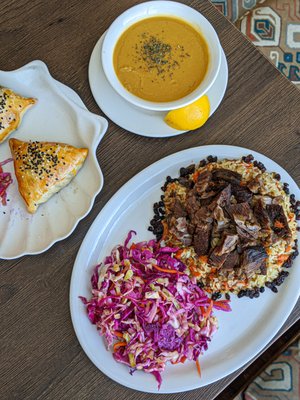 Photo of Khorasan Mediterranean Cuisine - San Diego, CA, US. Samsa(upper left), Uyghur Plov Beef (Middle) and Mercimeck Soup (upper right)
