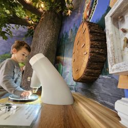 Sandcastles Children's Museum - Learning how to use a microscope