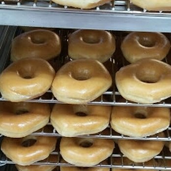 Best Donuts - GLAZED DONUTS, piled up to be ready to be sold, Best Donuts on NE 23rd Street, Midwest City - Donuts Near Me - Oklahoma City, Oklahoma