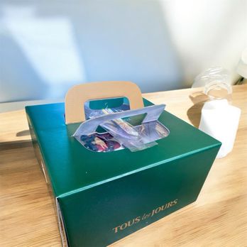 Tous Les Jours - High end packaging on blueberry cloud cake is- comes with a spatula and candles and matches. - Desserts Near Me - Torrance, California Tous Les Jours - High end packaging on blueberry cloud cake is- comes with a spatula and candles and matches. - Desserts Near Me - Torrance, California