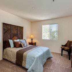 Discovery Point Retirement Community - Apartment Home Bedroom With Window Treatment