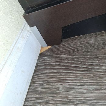 Rodeway Inn - Splinter of wood holding unlevel dresser in place - Hotels Near Me - Medford, Oregon Rodeway Inn - Splinter of wood holding unlevel dresser in place - Hotels Near Me - Medford, Oregon