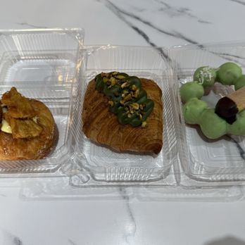 Munch Munch Mochi Donut - pineapple brûlée pastry, the Pandan mochi donut, and the pistachio kreme croissant - Donuts Near Me - Shenandoah, Texas