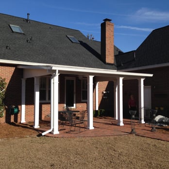 The Tompkins Company - The new patio addition is enhanced with the 8" matching aluminum columns supporting the shingled insulated roof system. - General Contractors Near Me - Augusta, Georgia The Tompkins Company - The new patio addition is enhanced with the 8" matching aluminum columns supporting the shingled insulated roof system. - General Contractors Near Me - Augusta, Georgia