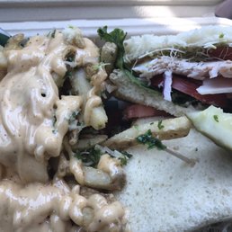 Turkey sandwich comes with Mayo, lettuce, tomato and sprouts. Barnyard style fries are delicious!