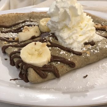 Nutella Cafe - Buckwheat crepe with banana, whipped cream and hazelnut. - Desserts Near Me - Chicago, Illinois Nutella Cafe - Buckwheat crepe with banana, whipped cream and hazelnut. - Desserts Near Me - Chicago, Illinois