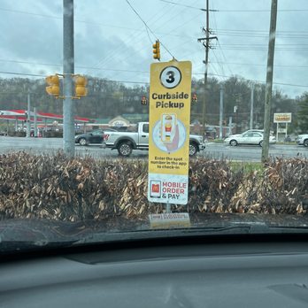 McDonald's - a sign on the windshield of a car - Burgers Near Me - Nashville, Tennessee McDonald's - a sign on the windshield of a car - Burgers Near Me - Nashville, Tennessee