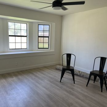 SG Construction - a room with a fan and two chairs - General Contractors Near Me - Victoria, Texas SG Construction - a room with a fan and two chairs - General Contractors Near Me - Victoria, Texas
