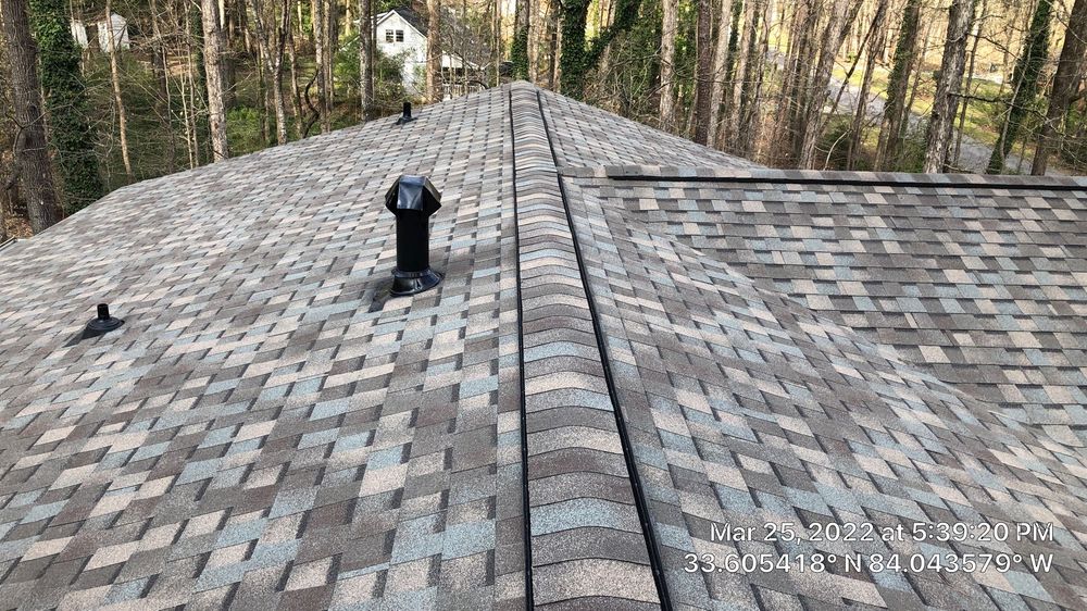 Slide of Rapid Roofers