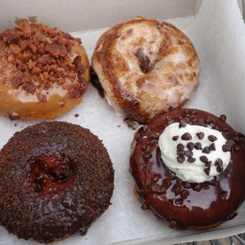 Beignets - Top left, clockwise: Maple bacon, cinnabun, cannoli, and thin mint! - Donuts Near Me - Denville, New Jersey Beignets - Top left, clockwise: Maple bacon, cinnabun, cannoli, and thin mint! - Donuts Near Me - Denville, New Jersey