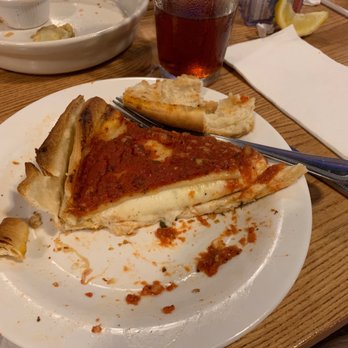Giordano's - Standard cheese deep dish pie. Note how the crust can't decide which way to set. - Italian Near Me - Orlando, Florida Giordano's - Standard cheese deep dish pie. Note how the crust can't decide which way to set. - Italian Near Me - Orlando, Florida