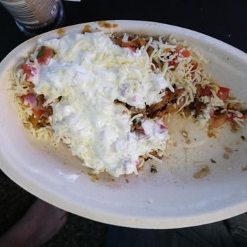 Chipotle Mexican Grill - This is a full serving Chipotle bowl.... Hope you like sour cream. MY GF couldn't even eat half of this half bowl. - Mexican Near Me - Blue Springs, Missouri