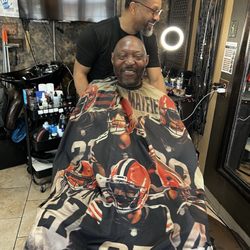 Jenesis Barbershop - After 18 yrs this client is still satisfied. Most of our clients are long term. The service and pricing is what the love