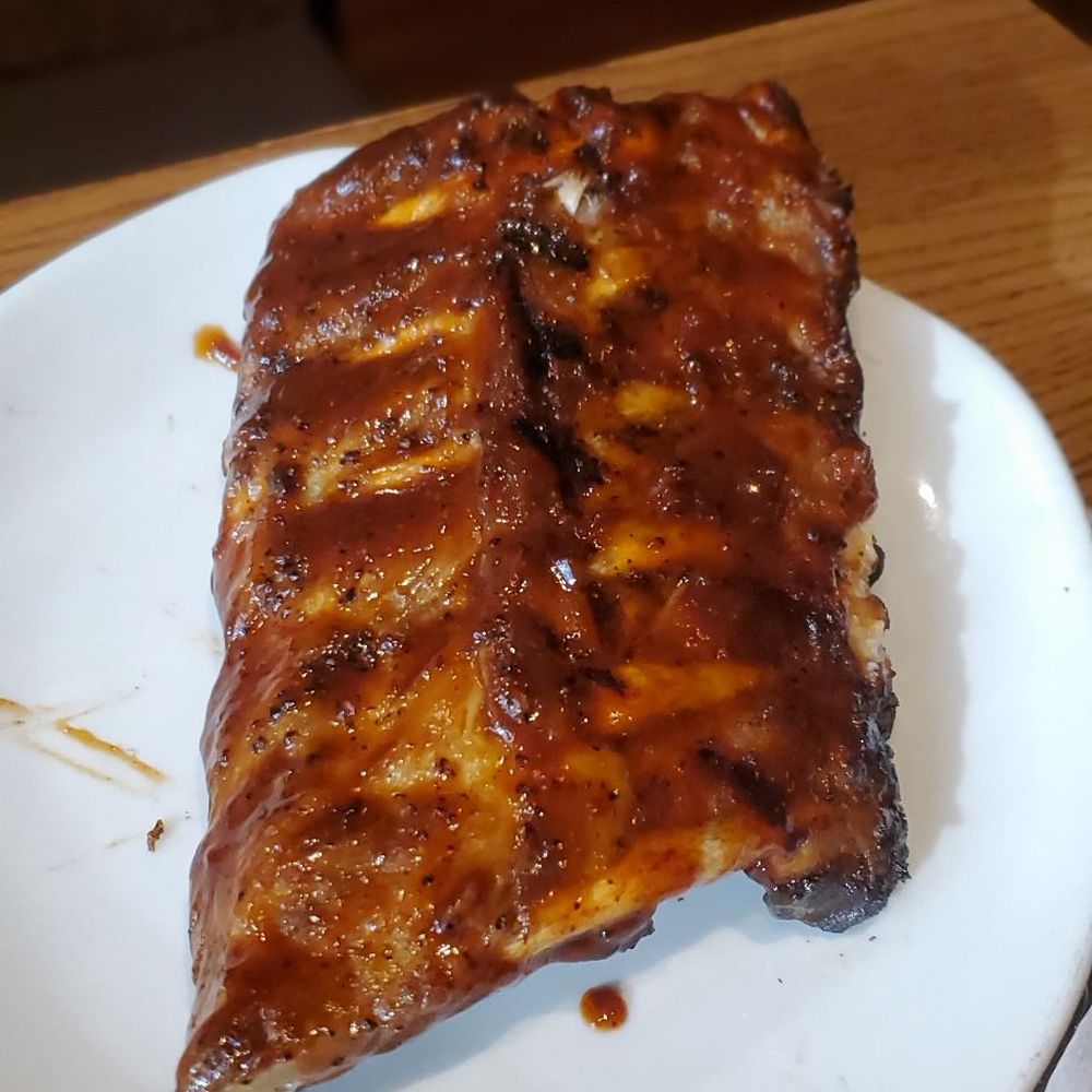 Outback Steakhouse - Baby Back Ribs, that accompanied the steak entree. - Steakhouses Near Me - Middletown, New York Outback Steakhouse - Baby Back Ribs, that accompanied the steak entree. - Steakhouses Near Me - Middletown, New York