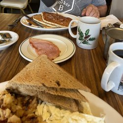 Linda's Family Diner - Three large blueberry pancakes with plenty of blueberries and a delicious slice of ham.