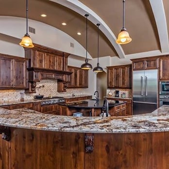 Robare Custom Homes - a large kitchen with a center island - General Contractors Near Me - San Antonio, Texas Robare Custom Homes - a large kitchen with a center island - General Contractors Near Me - San Antonio, Texas