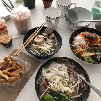 District Saigon - Wood and Herb Smoked Brisket Pho, Chicken Wings and Taro Fries, District Pho, Obama's Bn Cha, Thai Iced Tea - Vietnamese Near Me - Astoria, New York
