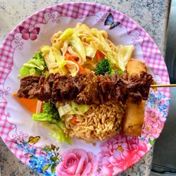 Vegan kabob with egg-less egg roll, noodles, and brown rice