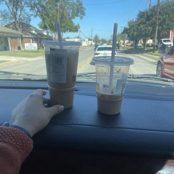 McDonald's - a person holding a cup of coffee - Fast Food Near Me - Kaufman, Texas