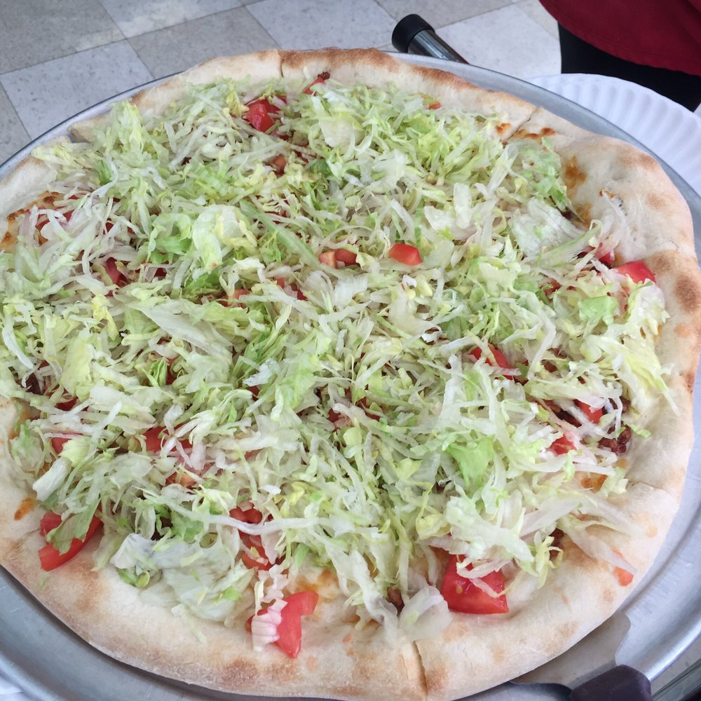 The BLT pizza. Definitely get it with mayo. We had it on the side because it sounded gross but the mayo made it that more amazing!!!!!! The BLT pizza. Definitely get it with mayo. We had it on the side because it sounded gross but the mayo made it that more amazing!!!!!!